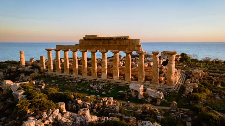 View on sea and ruins of greek columns in Selinunte Archaeological Park Sicily